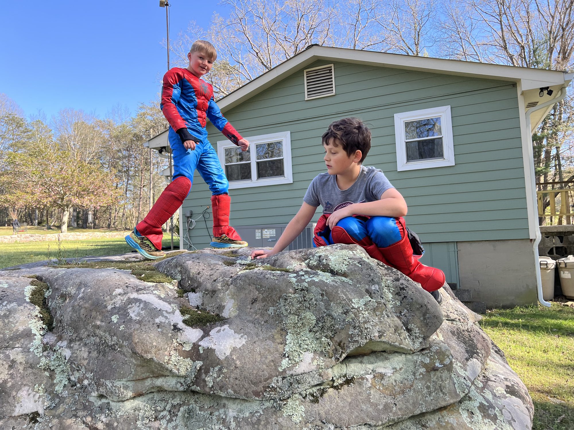 Adventures on the giant boulder beside the house